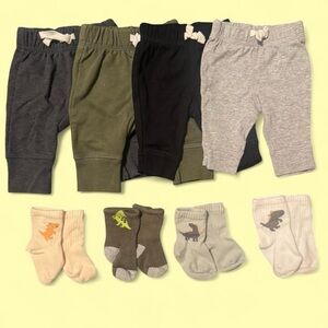 Newborn 2 Cat & Jack and 2 Carter’s pants w/ 4 dinosaur socks